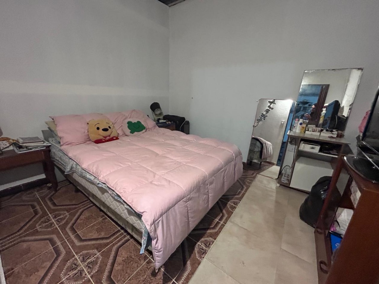 Parque Habitacional Ibarlucea, casa dos dormitorios con patio amplio, terreno de 300 m2