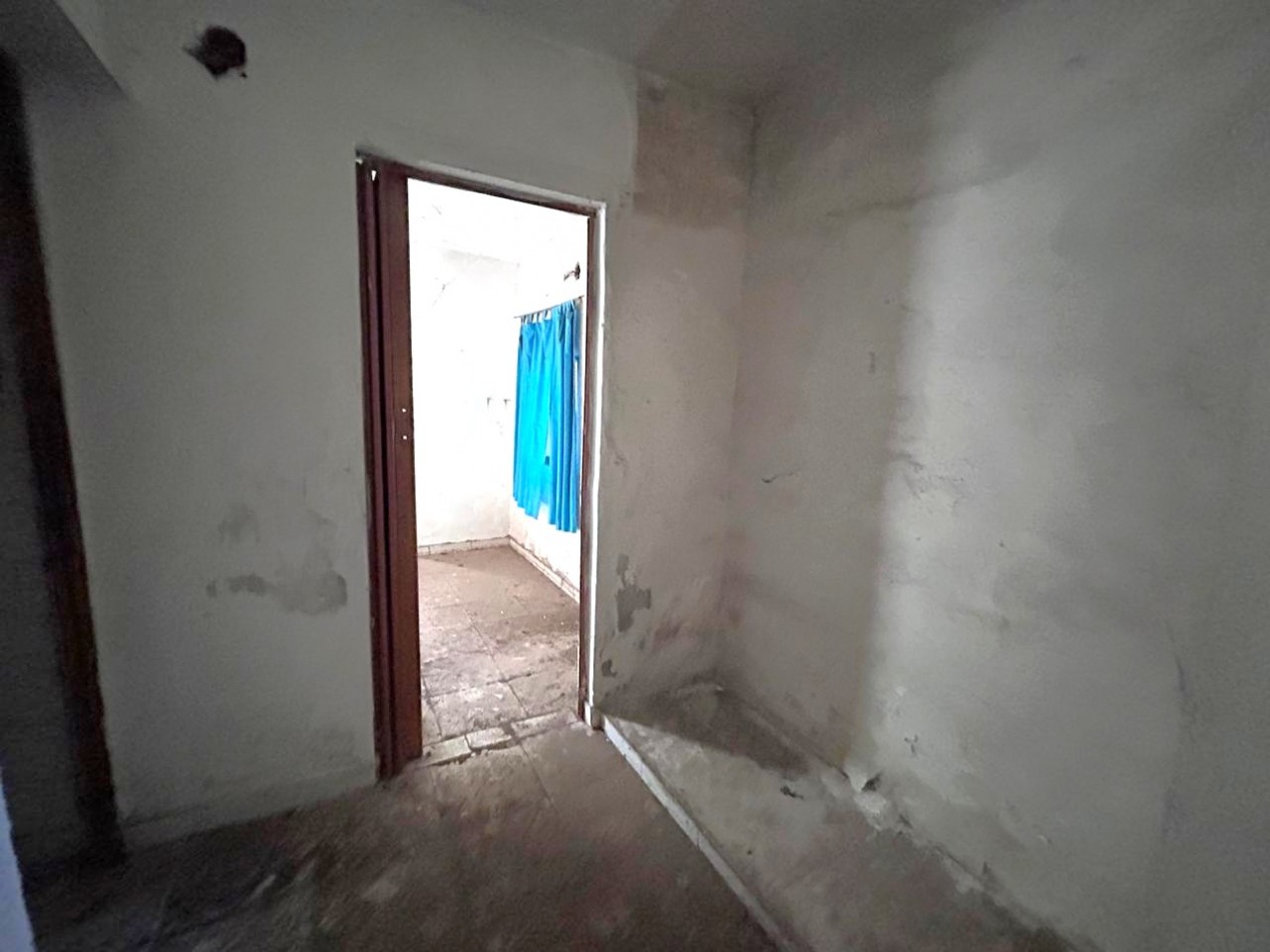 San Martin 6600, terreno interno, construccion a reciclar.